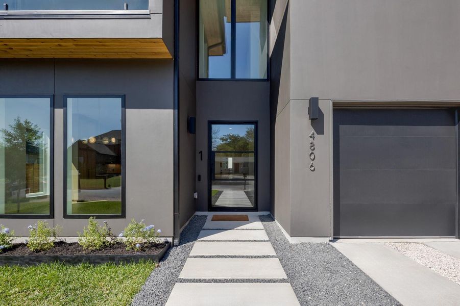 Property entrance featuring stucco siding Property entrance featuring stucco siding