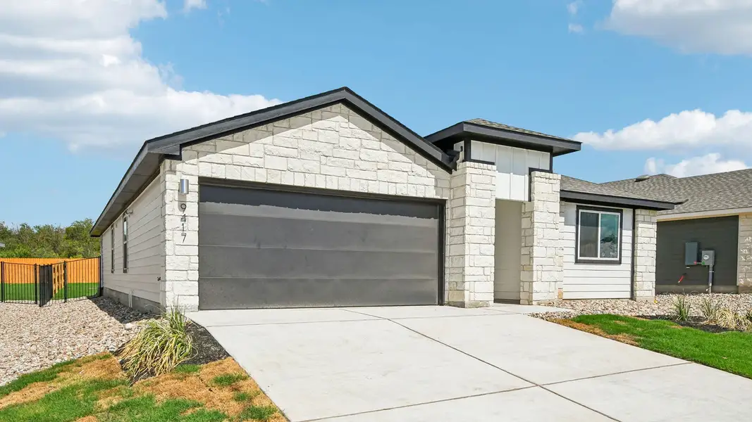 Front exterior of a new home in Trails at Wildhorse, Austin, TX, highlighting curb appeal (Image 17).