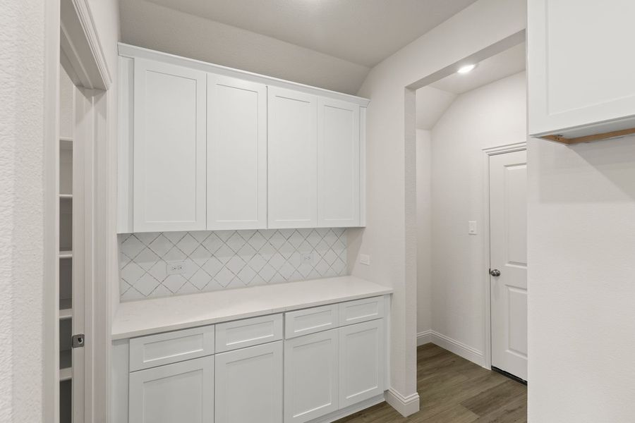 Furnished interior view inside a new home in Creekside, Royse City (Image 12).