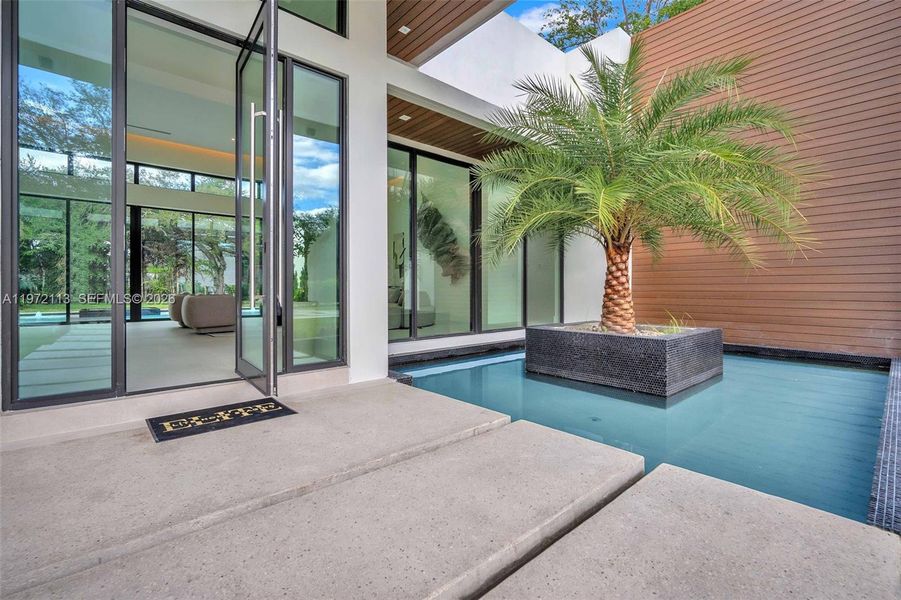 Exterior details and patio area of a home in , Miami (Image 21). Exterior details and patio area of a home in , Miami (Image 21).