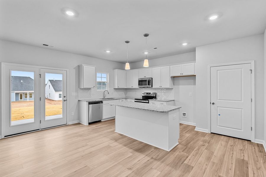 Furnished interior view inside a new home in Fieldstone, Lexington (Image 6).