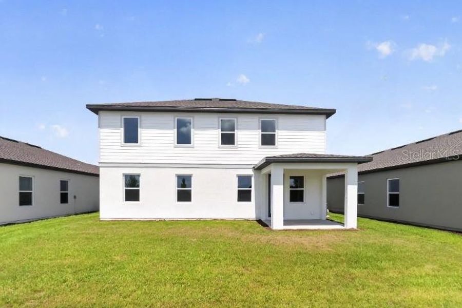 Exterior details and patio area of a home in , Kissimmee (Image 4).