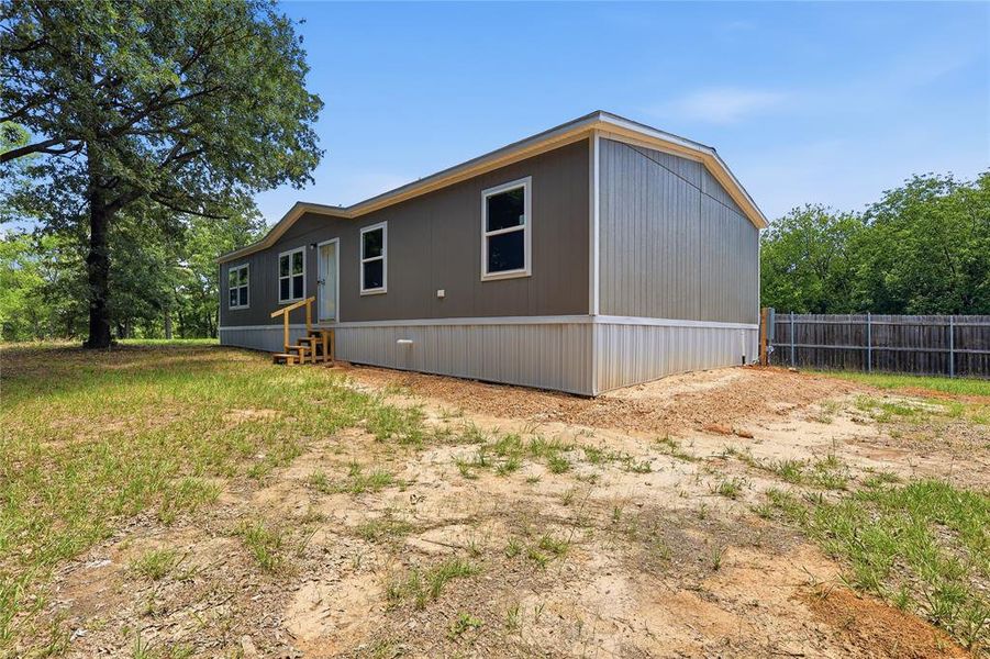 Exterior details and patio area of a home in , Quitman (Image 18).