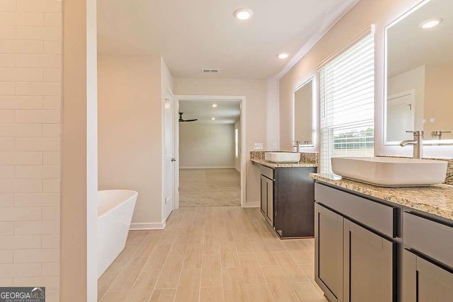 Furnished interior view inside a new home in Fern Dale, Fairburn (Image 6).