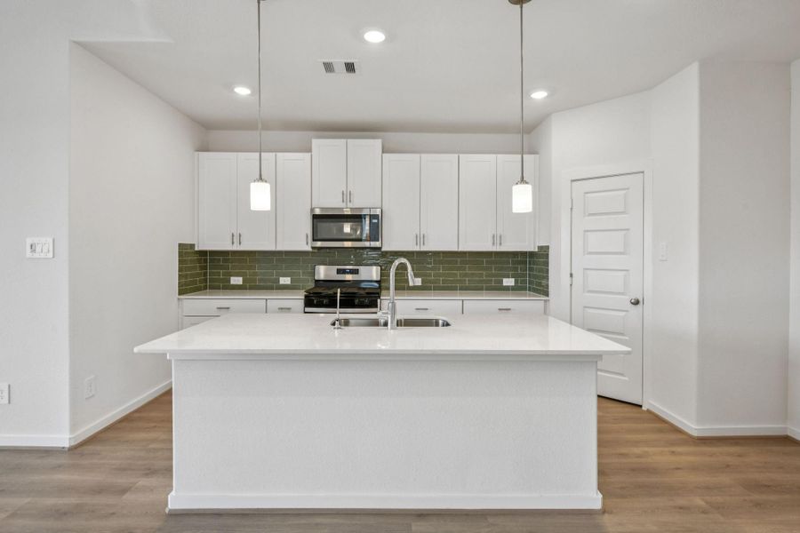 Photo is not of the actual home, but is an inspirational photo of builder’s model home and may depict options, furnishings, and/or decorator features that are not included