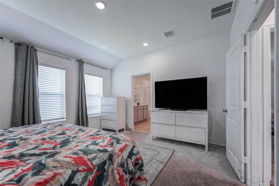 Spacious primary bedroom with two closets and private ensuite bath. Natural light and quiet comfort in Sunterra, Katy’s resort-style neighborhood. Spacious primary bedroom with two closets and private ensuite bath. Natural light and quiet comfort in Sunterra, Katy’s resort-style neighborhood.