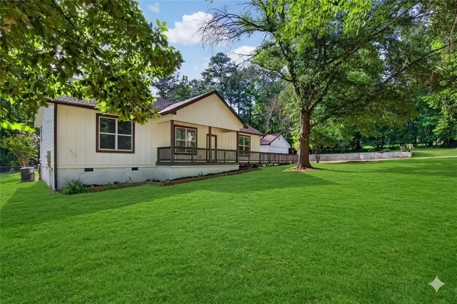 Exterior details and patio area of a home in , Locust Grove (Image 17).