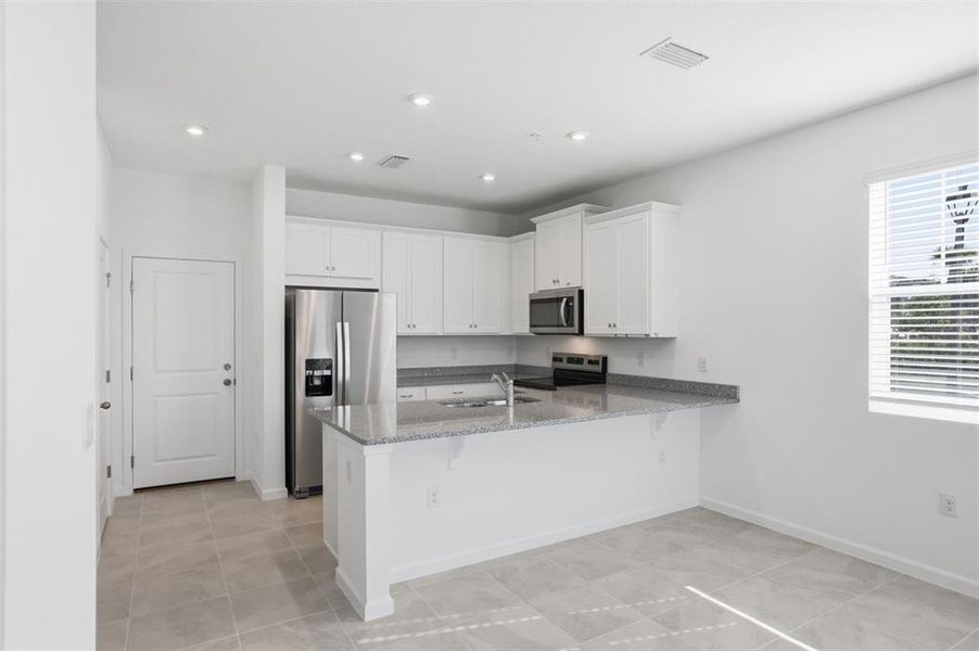 Furnished interior view inside a new home in Gardenia Reserve, Apopka (Image 12). Furnished interior view inside a new home in Gardenia Reserve, Apopka (Image 12).