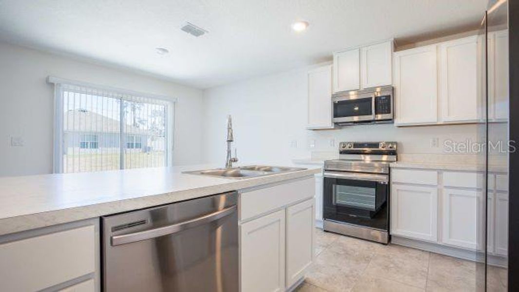 Furnished interior view inside a new home in Royal Highlands, Weeki Wachee (Image 11).