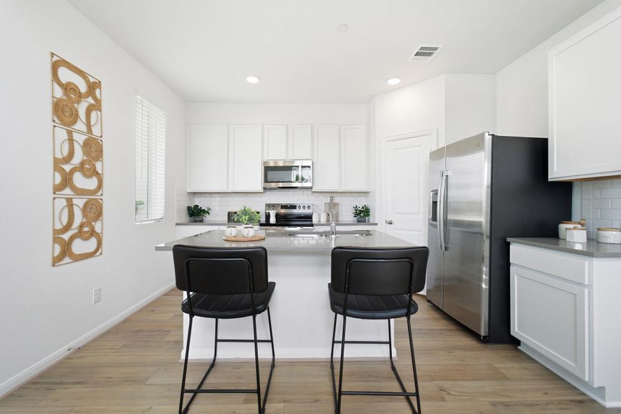 Furnished interior view inside a new home in Municipal Drive Townhomes, Leander (Image 10). Furnished interior view inside a new home in Municipal Drive Townhomes, Leander (Image 10).