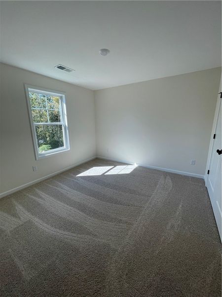 Spacious, unfurnished interior of a new home in Springwood Grove, Central (Image 20).