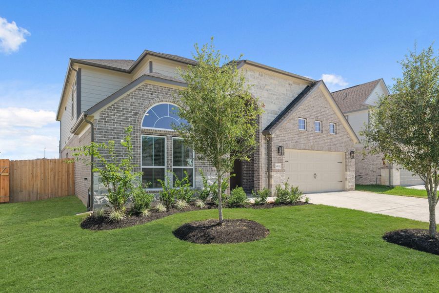 Front exterior of a new home in Briarwood Crossing, Rosenberg, TX, highlighting curb appeal (Image 1). Front exterior of a new home in Briarwood Crossing, Rosenberg, TX, highlighting curb appeal (Image 1).