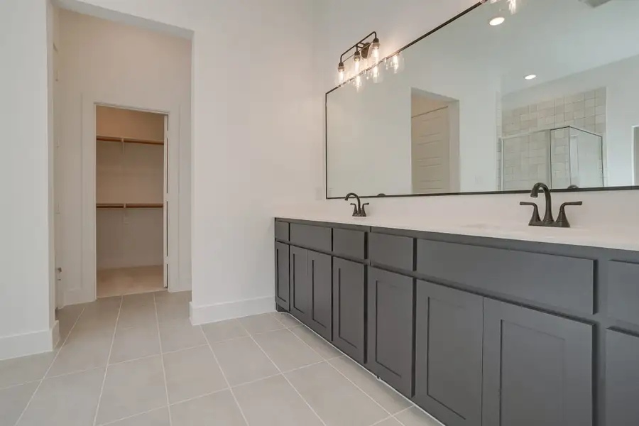 Representative furnished interior of a home built from the Longview by Graham Hart Home Builder in Bear Ridge, Burleson (Image 4).