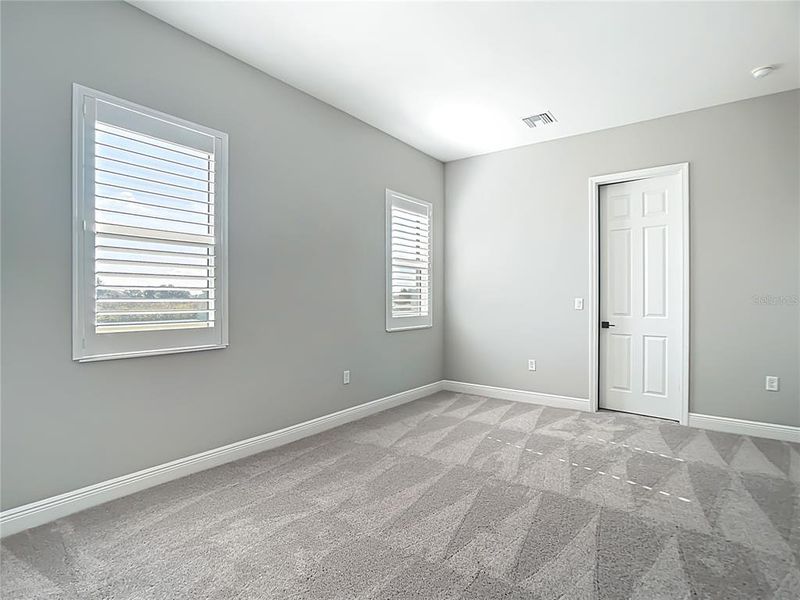 Spacious, unfurnished interior of a new home in Hampton Lakes, Sarasota (Image 49). Spacious, unfurnished interior of a new home in Hampton Lakes, Sarasota (Image 49).