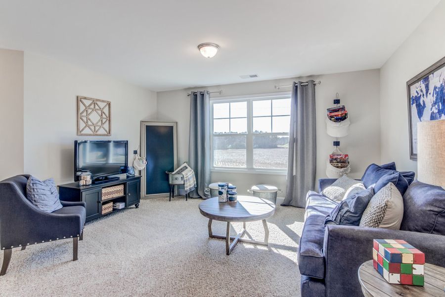 Representative furnished interior of a home built from the Drayton by Caviness & Cates Communities in Maggie Way, Wendell (Image 35).