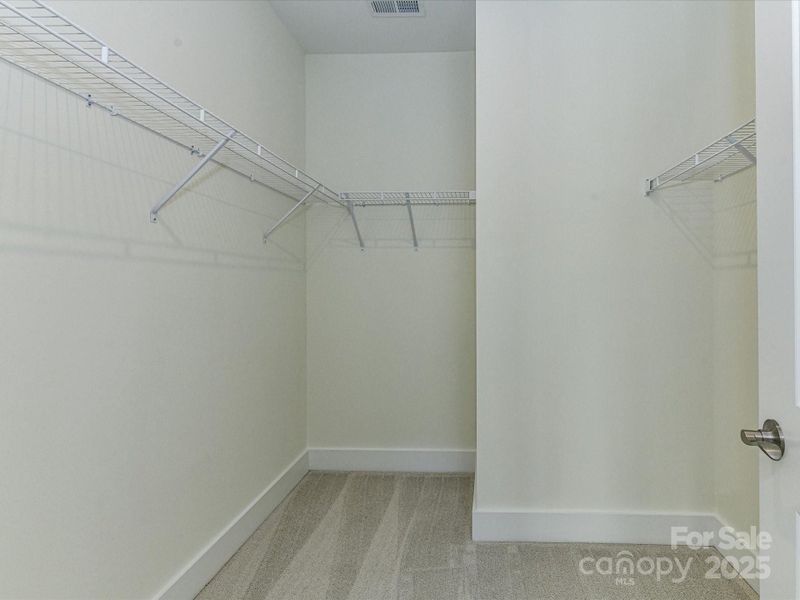 Primary Walk-In Closet.