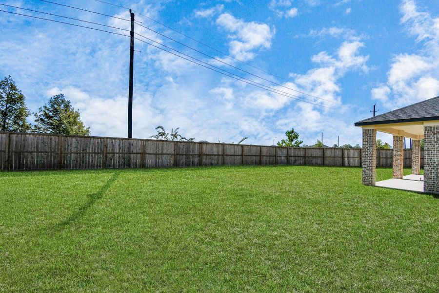 Backyard retreat, offering an abundance of space for kids to play and explore. The possibilities are endless in this outdoor haven, where the joy of open-air activities and family gatherings awaits. Backyard retreat, offering an abundance of space for kids to play and explore. The possibilities are endless in this outdoor haven, where the joy of open-air activities and family gatherings awaits.