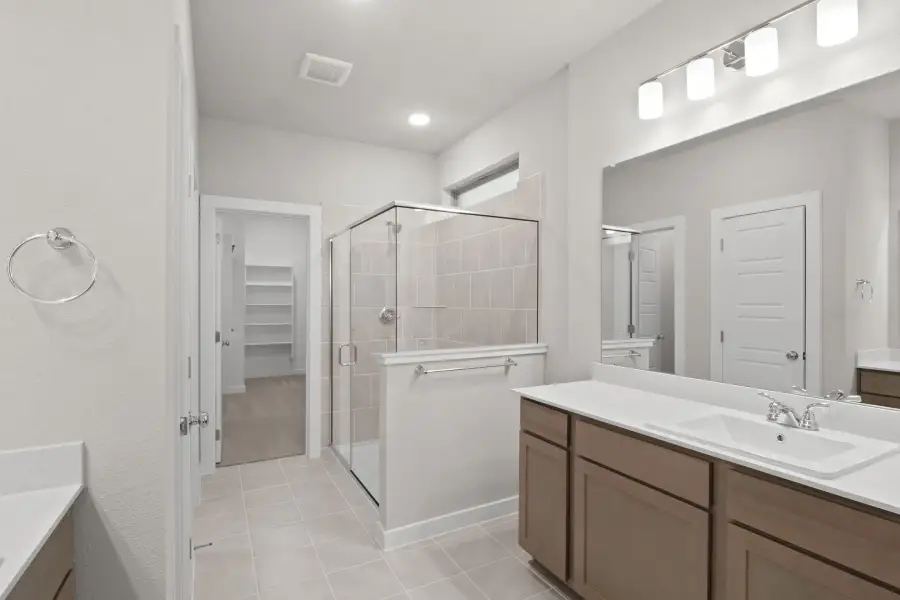 Primary Bathroom in the Willow home plan by Trophy Signature Homes – REPRESENTATIVE PHOTO Primary Bathroom in the Willow home plan by Trophy Signature Homes – REPRESENTATIVE PHOTO