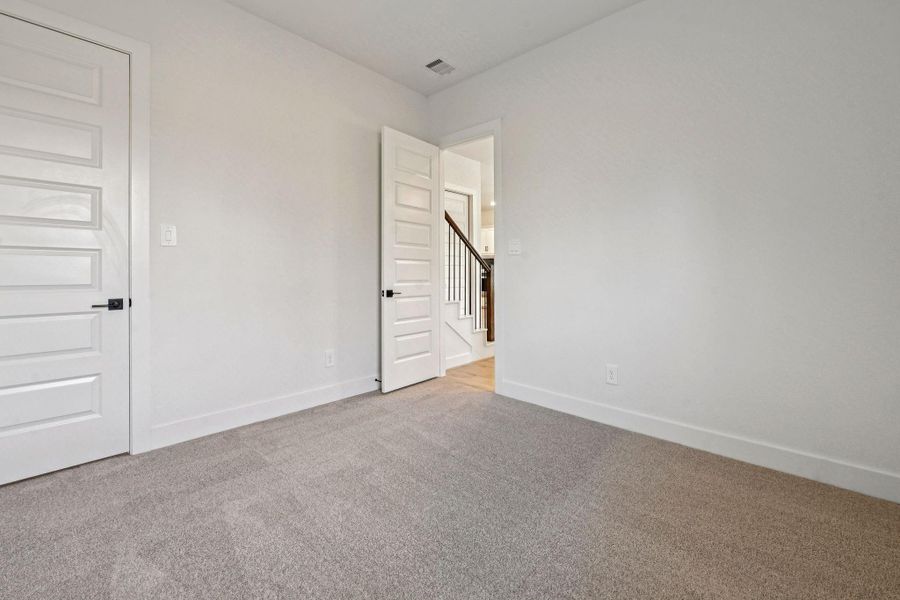 Spacious, unfurnished interior of a new home in Pinewood Trails - Luxe Series, Houston (Image 37).