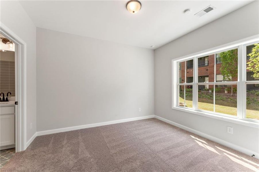 Spacious, unfurnished interior of a new home in Townes at South Main, Kennesaw (Image 21).