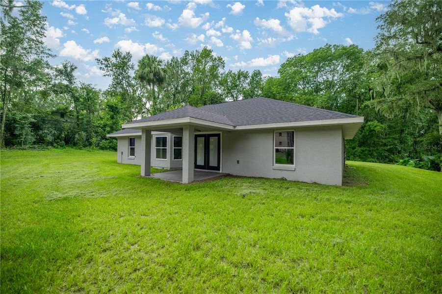 Front exterior of a new home in , Ocala, FL, highlighting curb appeal (Image 2).
