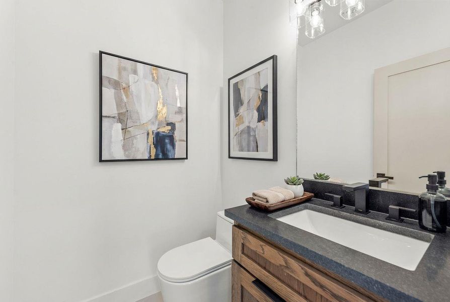 Well-appointed half bath for guests.