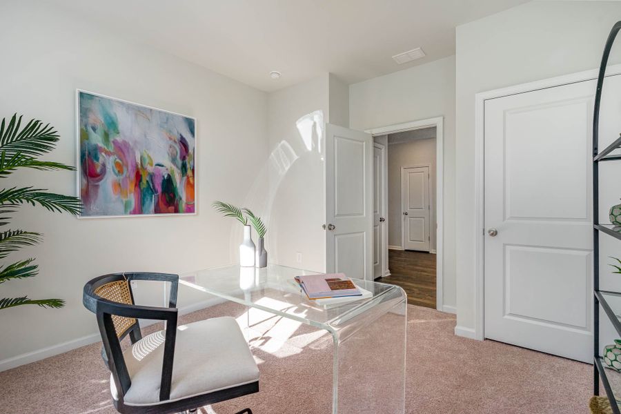 Representative furnished interior of a home built from the CALI by D.R. Horton in Kingston Bay, Conway (Image 11).