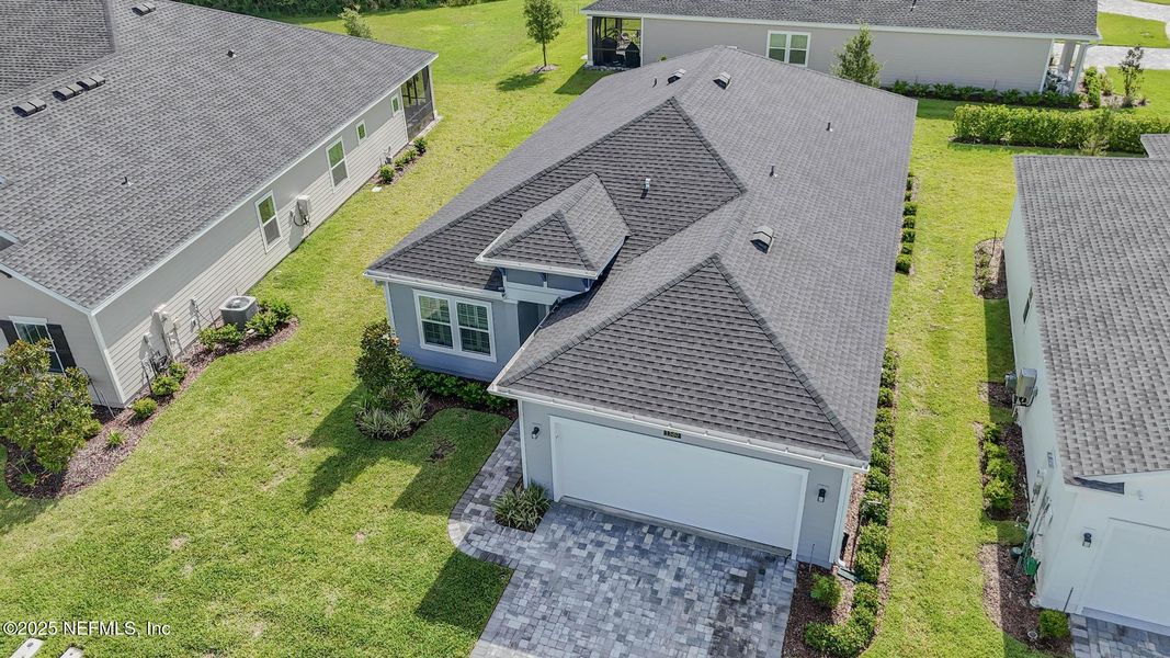 Front exterior of a new home in Stillwater | Active Adult 55+: Stillwater (50s) - Royal Collection, St. Johns, FL, highlighting curb appeal (Image 25). Front exterior of a new home in Stillwater | Active Adult 55+: Stillwater (50s) - Royal Collection, St. Johns, FL, highlighting curb appeal (Image 25).