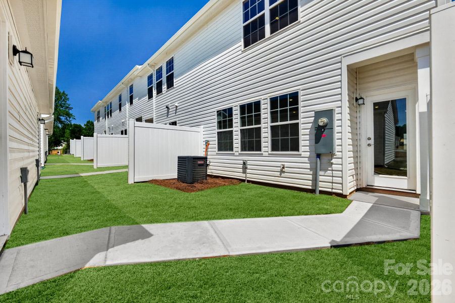 Exterior details and patio area of a home in The Vines, Charlotte (Image 3).