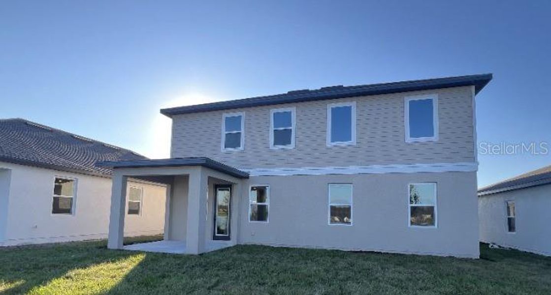 Exterior details and patio area of a home in Hawks Run, Kissimmee (Image 4). Exterior details and patio area of a home in Hawks Run, Kissimmee (Image 4).