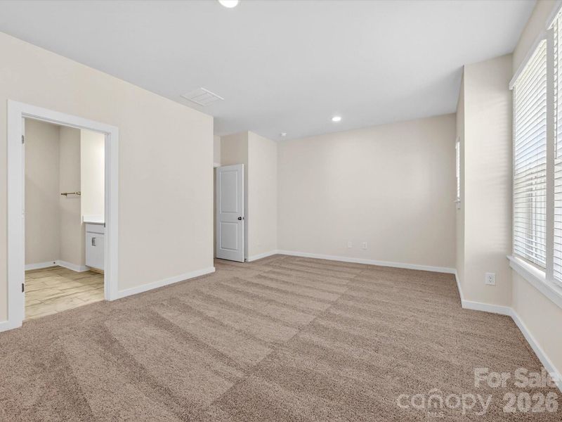 Spacious, unfurnished interior of a new home in Central Living at Craig, Charlotte (Image 13).