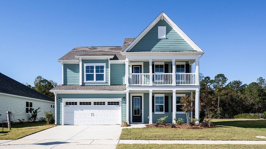 Front exterior of a new home in Indigo Preserve, Leland, NC, highlighting curb appeal (Image 1).