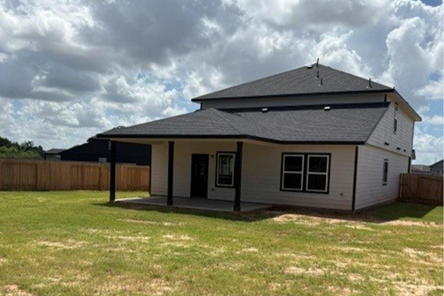 Exterior details and patio area of a home in Bluestem, Brookshire (Image 3). Exterior details and patio area of a home in Bluestem, Brookshire (Image 3).