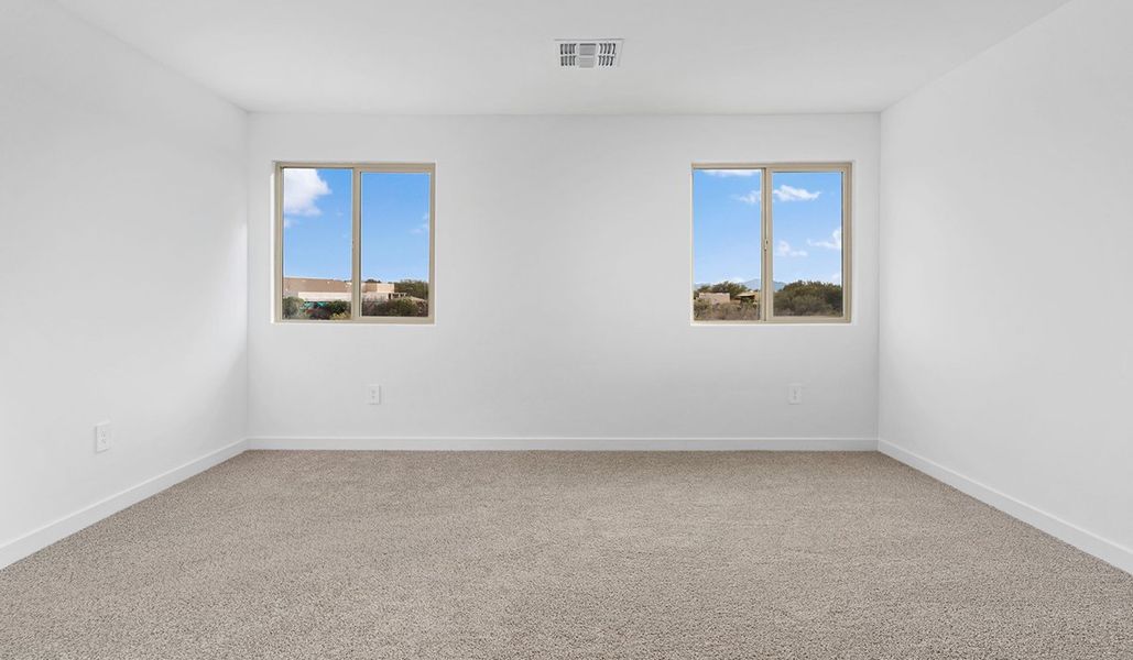 Spacious, unfurnished interior of a new home in The Oasis at Rocking K, Vail (Image 38).