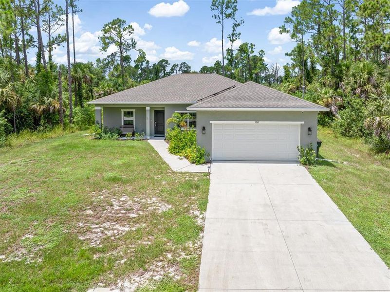 Front exterior of a new home in , North Port, FL, highlighting curb appeal (Image 2).