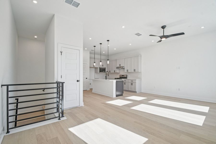 Spacious, unfurnished interior of a new home in Koenig Townhomes, Austin (Image 13).