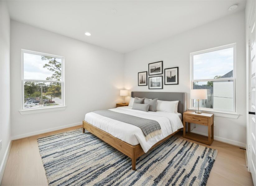 Secondary bedroom on the third floor that can also be a gameroom. *Virtually staged*