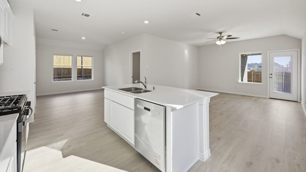 Representative furnished interior of a home built from the Orion by D.R. Horton in Windchime, Celina (Image 6).