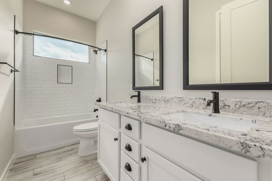 Furnished interior view inside a new home in Valencia at Granite Vista, Waddell (Image 12).