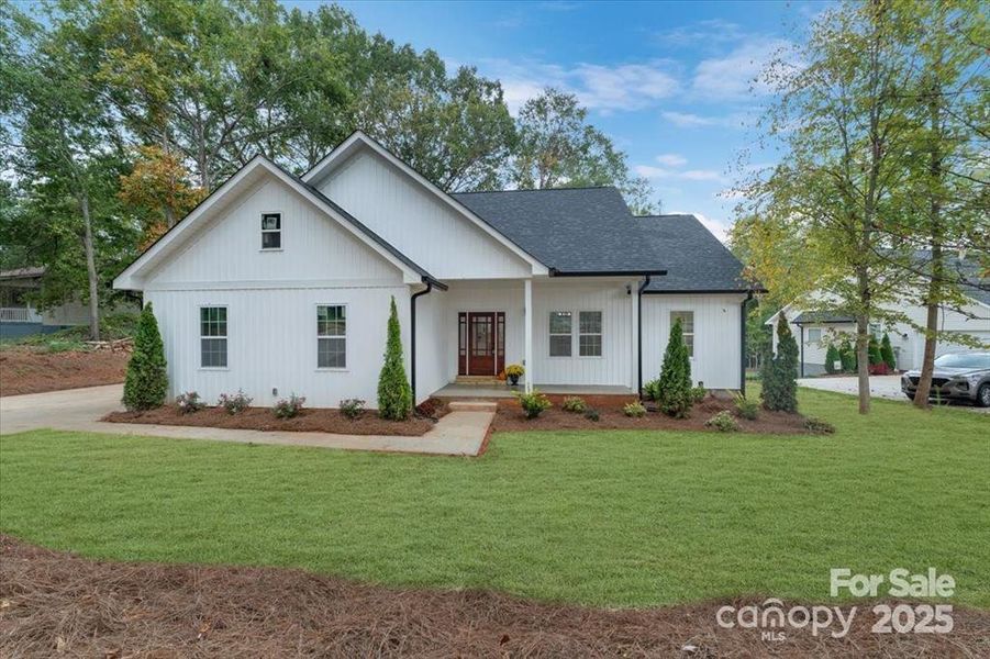 Front exterior of a new home in , Bessemer City, NC, highlighting curb appeal (Image 1). Front exterior of a new home in , Bessemer City, NC, highlighting curb appeal (Image 1).