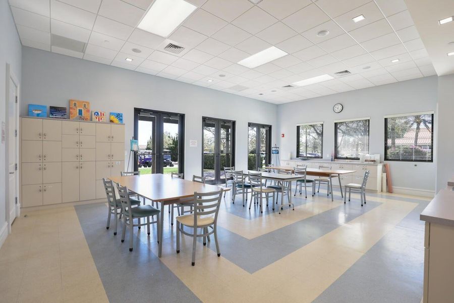 Furnished interior view inside a new home in PGA Village Verano, Port St. Lucie (Image 17).