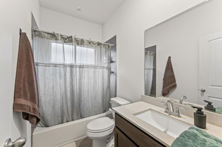 Furnished interior view inside a new home in Cypress Oaks North, Cypress (Image 15).