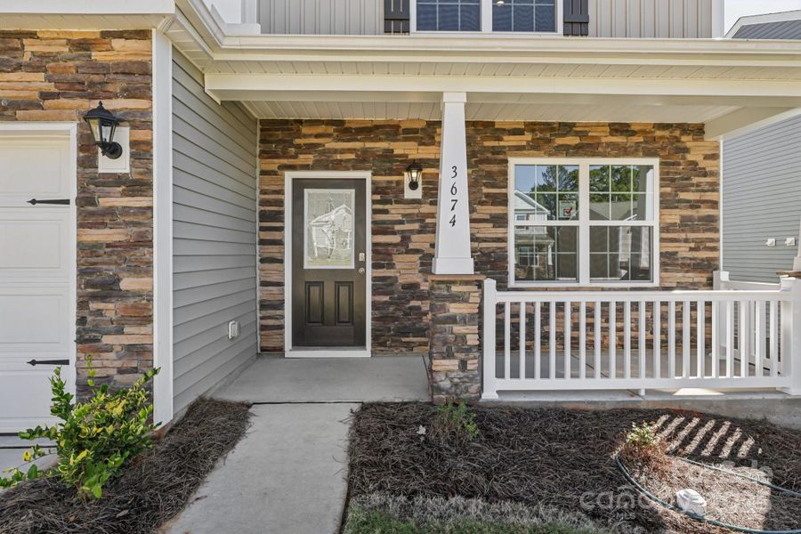 Exterior details and patio area of a home in Cline Village, Conover (Image 2).