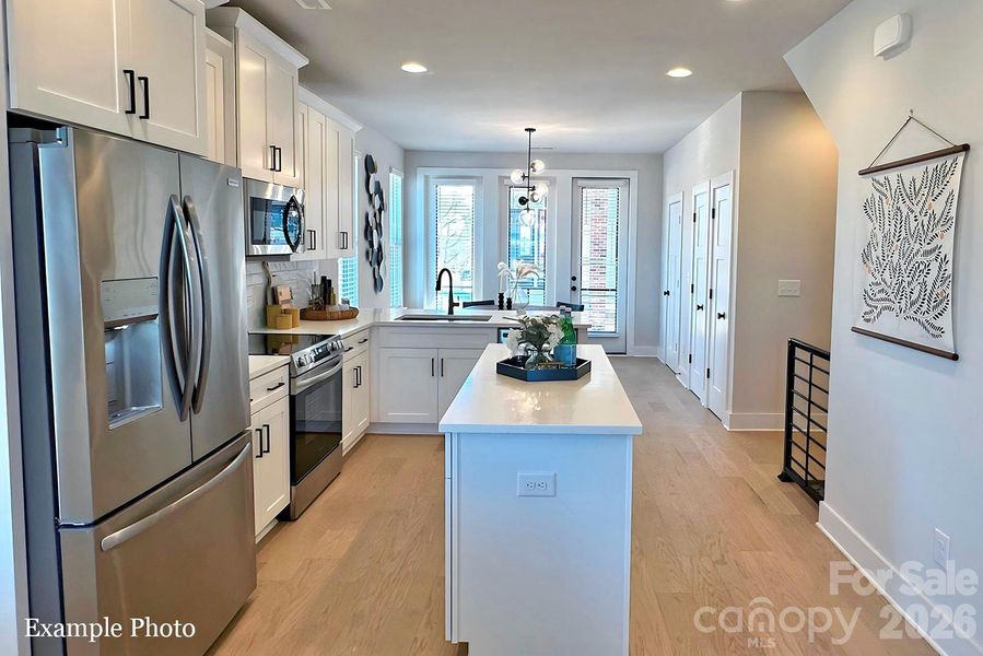 Furnished interior view inside a new home in North End Terraces, Charlotte (Image 7).
