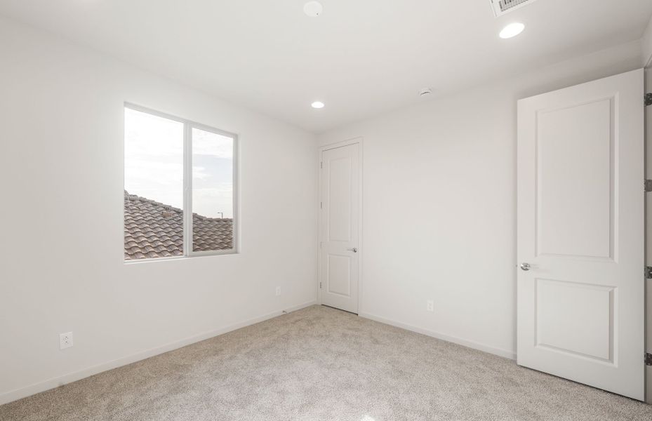 Spacious, unfurnished interior of a new home in Legado West, Queen Creek (Image 26).