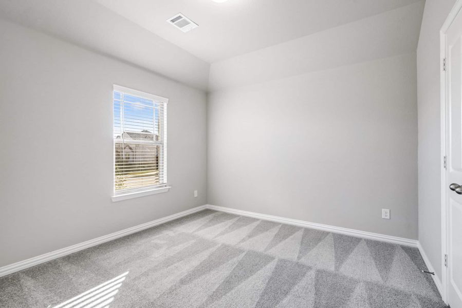 Representative unfurnished interior of a home built from the The Tulip by Lillian Custom Homes in The Preserve, Sherman (Image 17).