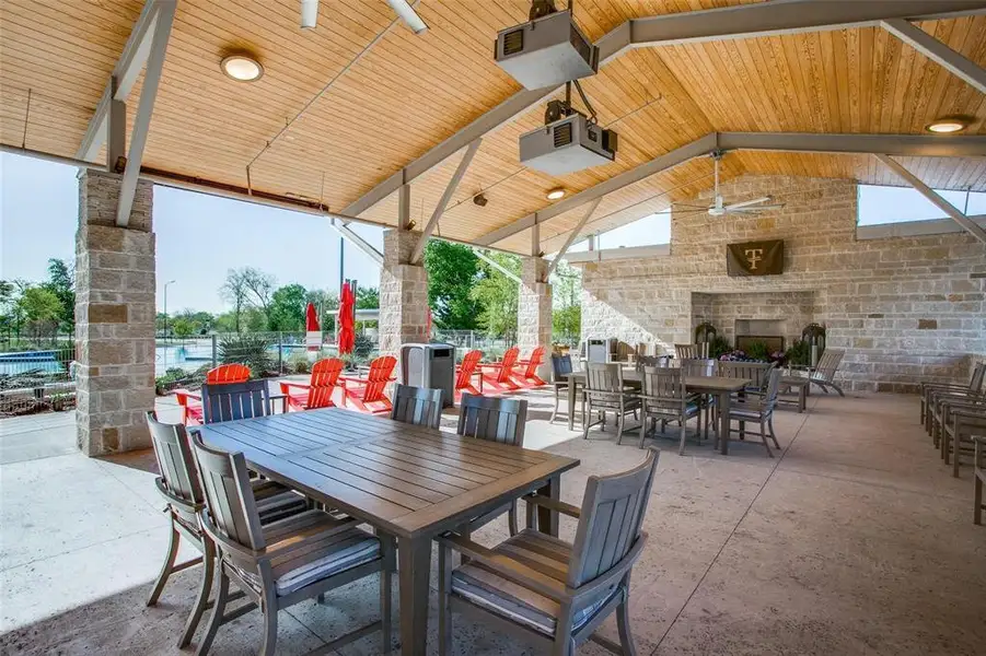 View of patio / terrace featuring outdoor dining space and ceiling fan View of patio / terrace featuring outdoor dining space and ceiling fan