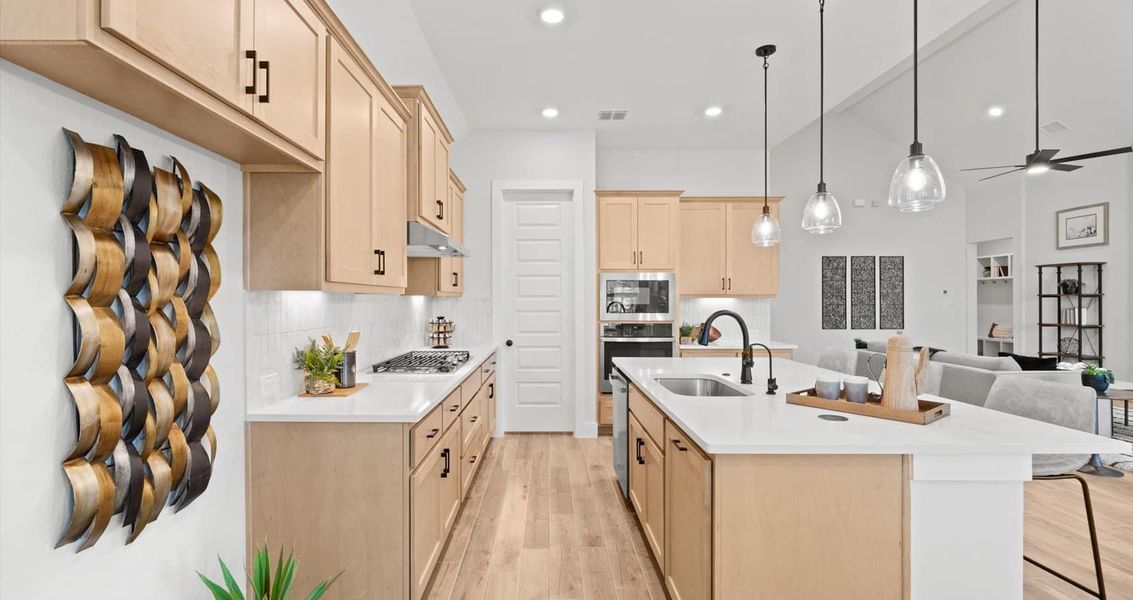 Furnished interior view inside a new home in 6 Creeks, Kyle (Image 7).