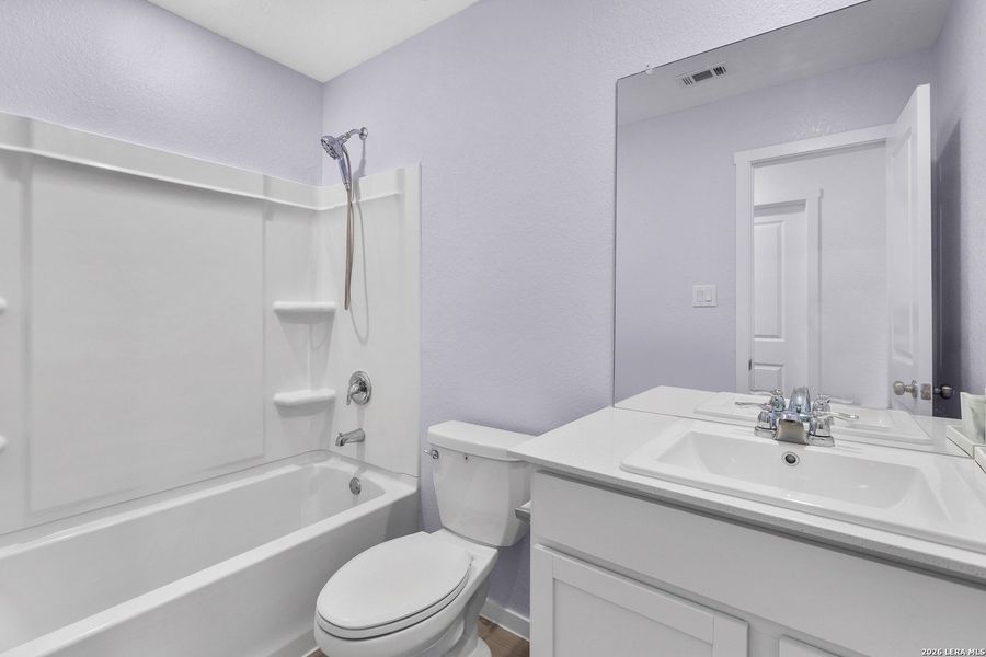 Furnished interior view inside a new home in Brookmill, San Antonio (Image 10).