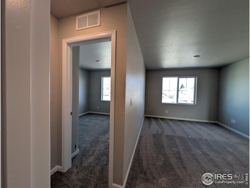 Spacious, unfurnished interior of a new home in Highlands Preserve, Mead (Image 12).